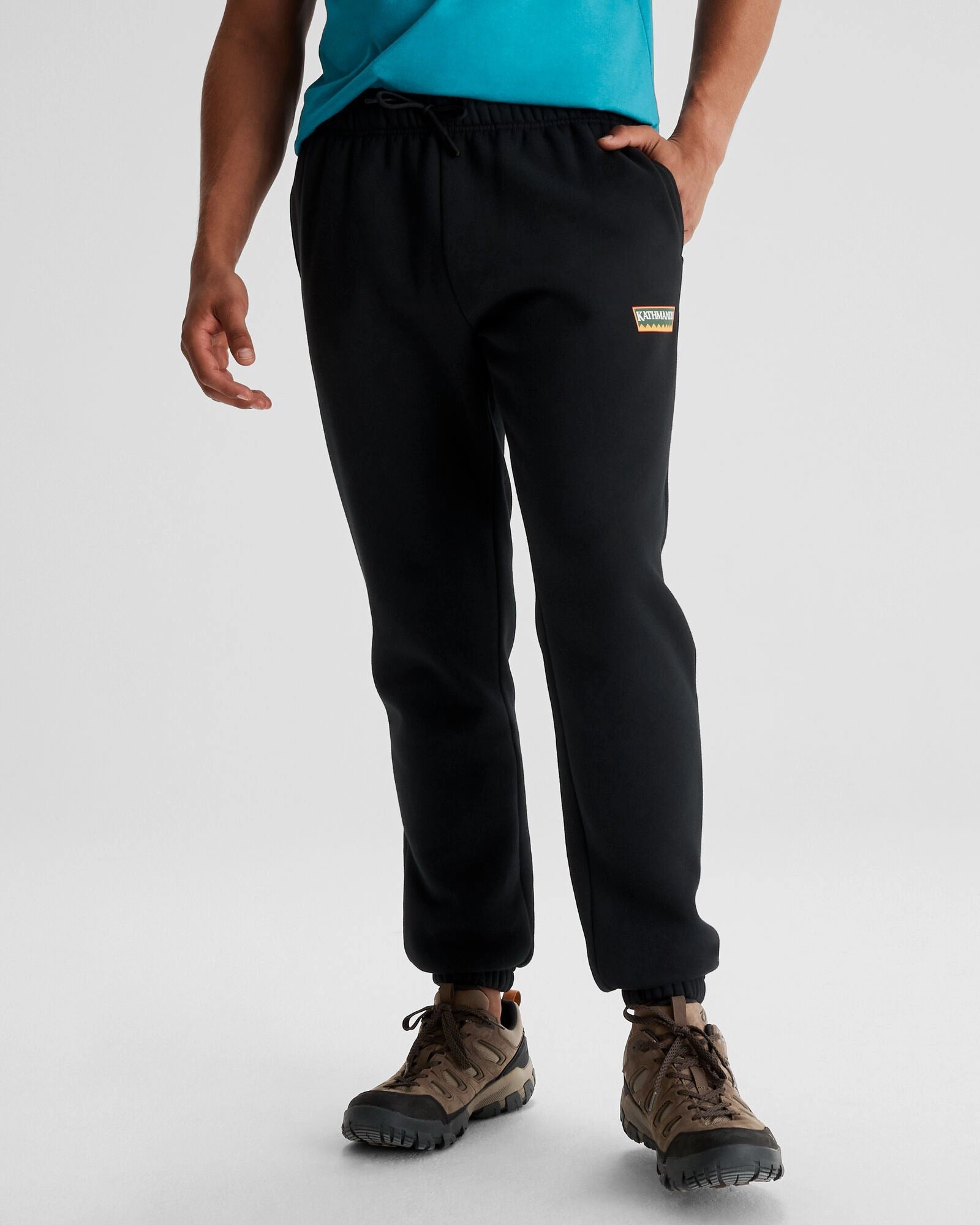 Men's Kathmandu Heritage Logo Slouchy Joggers - Black Flexible Motion