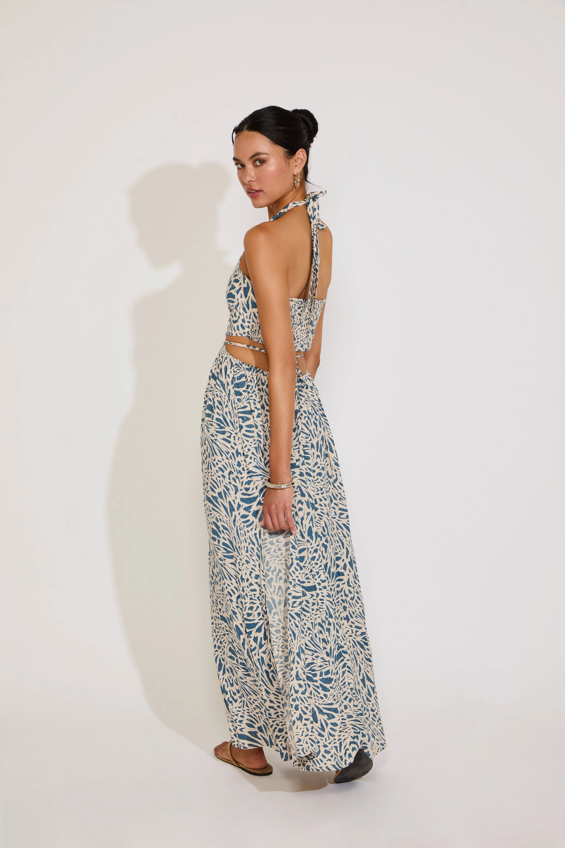 PRINTED HALTER MAXI DRESS WITH O RING CUTOUTS Travel Essential flattering appearance